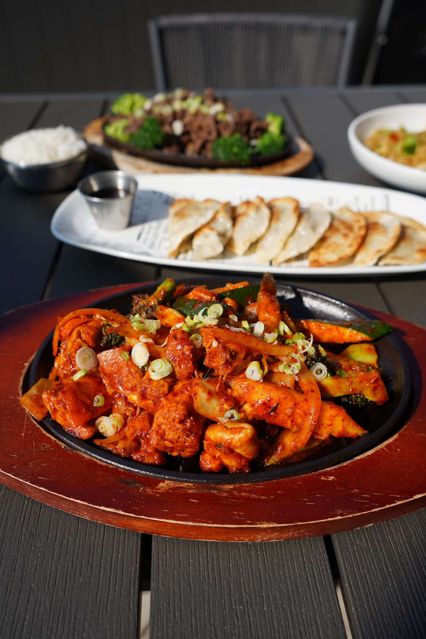 Spicy chicken bulgogi on a sizzling cast-iron plate